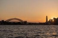 Golden hour over Sydney Harbour Bridge and city skyline